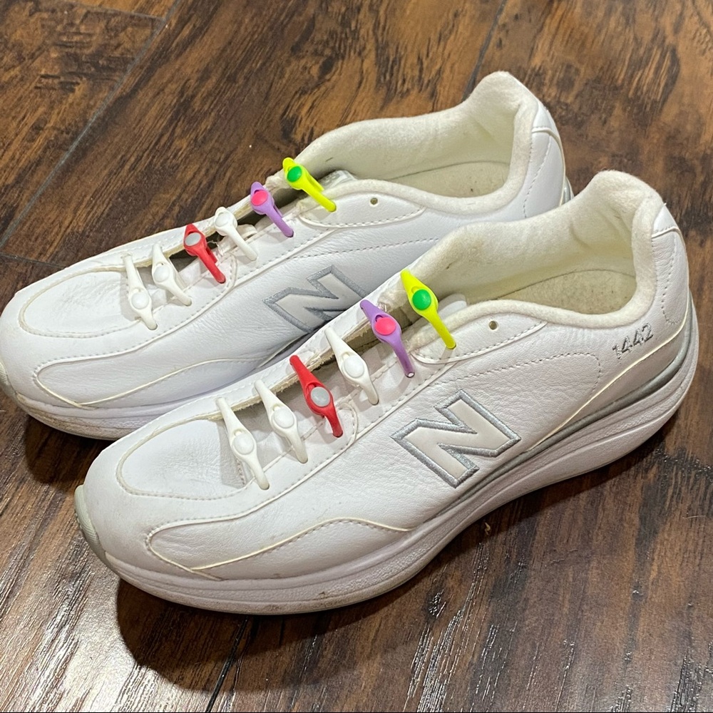 New Balance White Leather Athletic Sneakers with Colorful Lace Charms